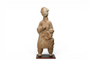 A Terracotta Figure of a Cook Holding Birds