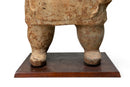 A Terracotta Figure of a Cook Holding Birds