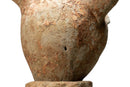 A Terracotta Figure of a Cook Holding Birds