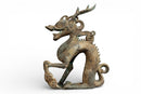 A Bronze Figure of a Crouching Dragon