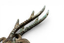 A Bronze Figure of a Crouching Dragon