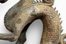 A Bronze Figure of a Crouching Dragon