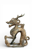 A Bronze Figure of a Crouching Dragon