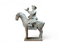 An Equestrian Figure with Bird