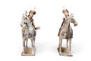 A Pair of Painted Equestrian Figures