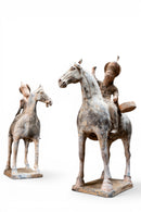 A Pair of Painted Equestrian Figures