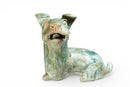 A Han Figure of a Reclining Dog