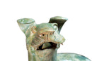 A Han Figure of a Reclining Dog