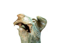 A Han Figure of a Reclining Dog