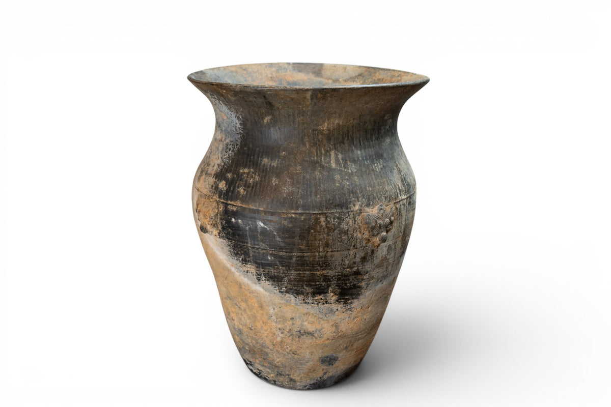 A Dragon-Mask Pottery Vessel