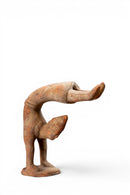 A Terracotta Acrobat Figure
