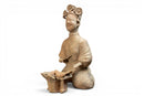 A Terracotta Figure of a Cook