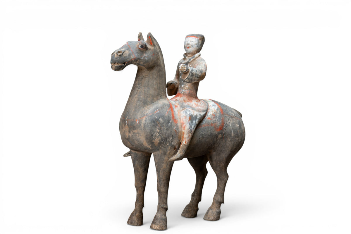 A Large Painted Pottery Equestrian Figure