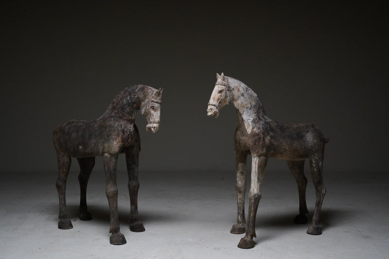 A Pair of Tang Dynasty Pottery Horses