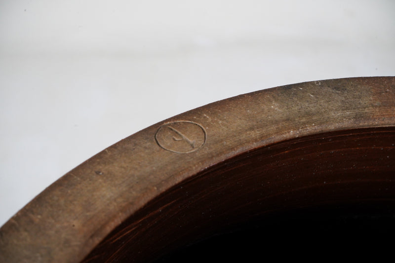 An Unglazed Vessel