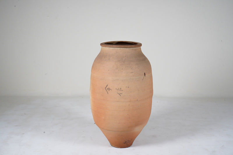 An Unglazed Vessel