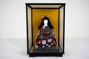 A Japanese Doll With Display