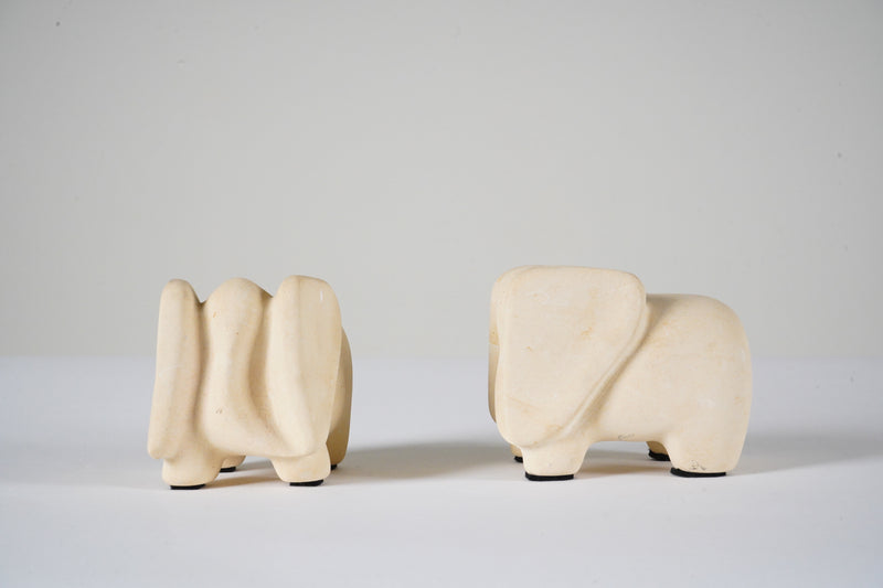 A Pair of Tufa Limestone Elephant