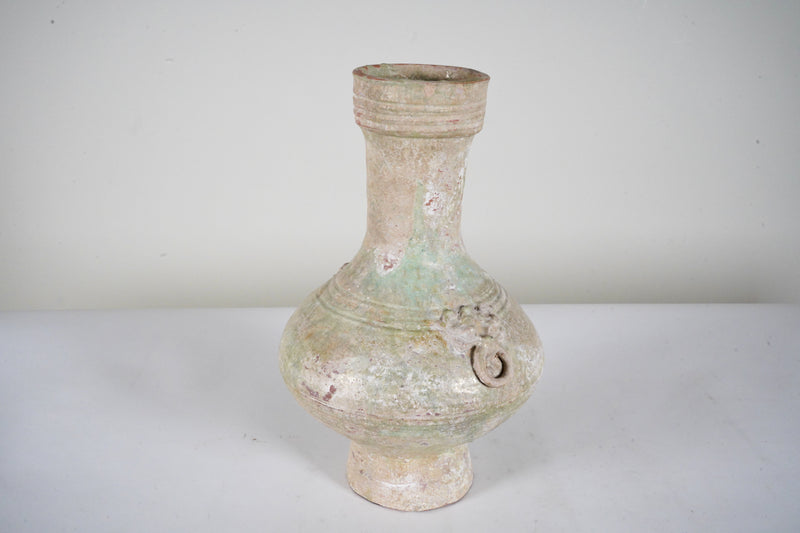 A Tall-Necked Han (206BC - 220AD)  Glazed Hu Vessel