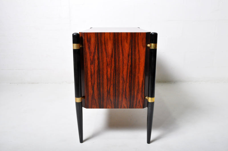 A Chest of Drawers With Macassar Veneer