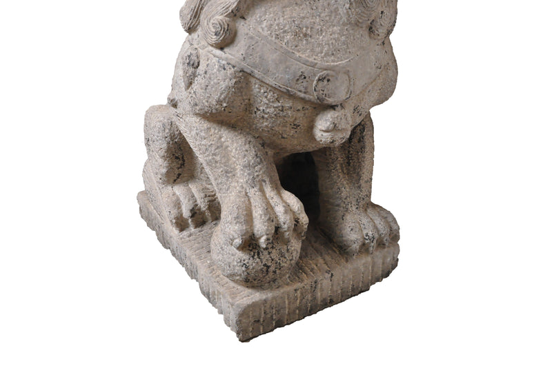 A Pair of Carved Stone Fu dogs