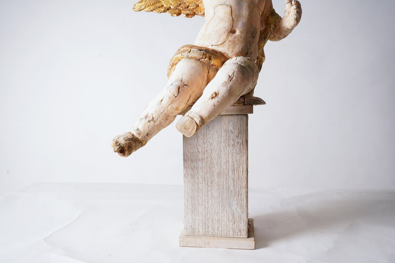 A Cherub Carved From Wood With Polychrome & Gilt