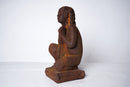 A Cast Iron Figure of a Young Boy