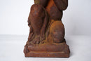 A Cast Iron Figure of a Young Boy