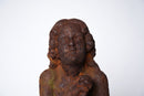A Cast Iron Figure of a Young Boy