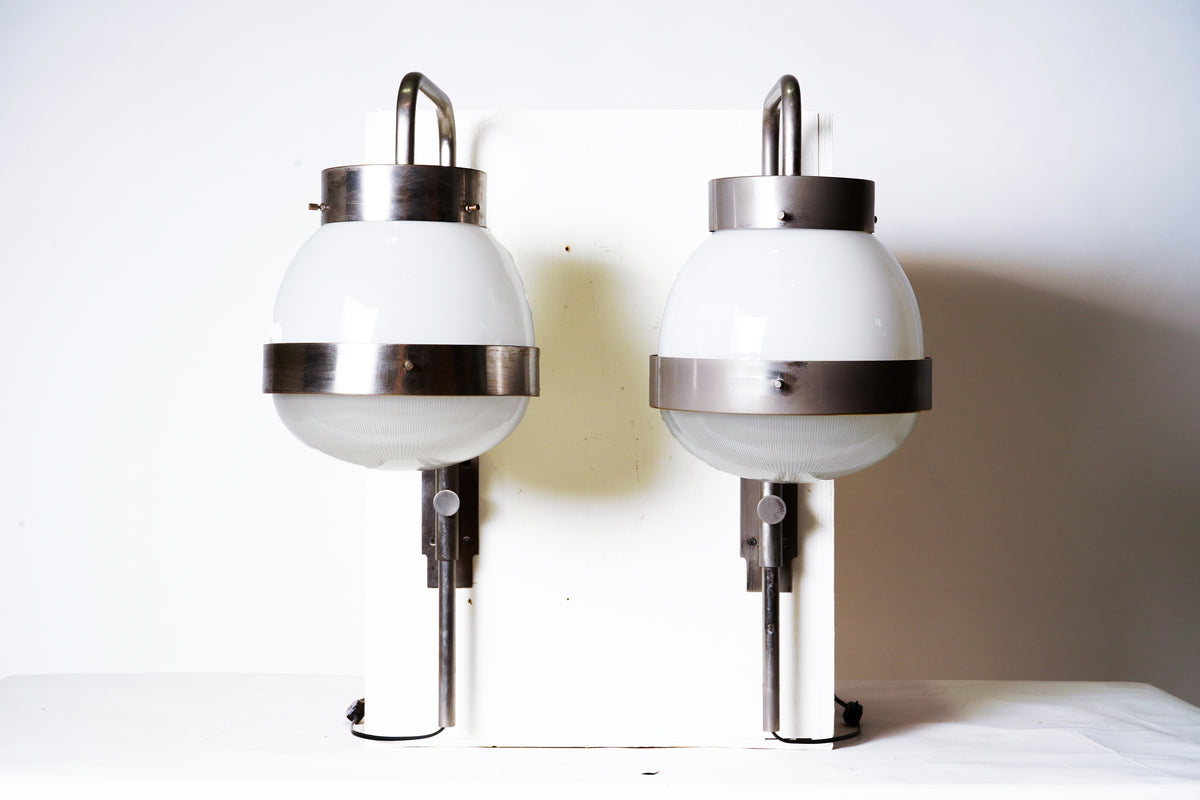 A Pair of Brushed Steel And Glass Wall Lamps