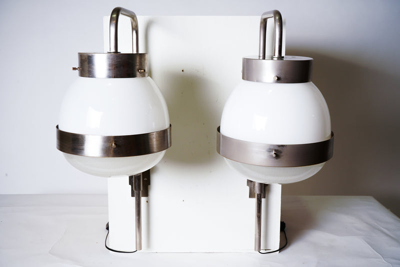 A Pair of Brushed Steel And Glass Wall Lamps
