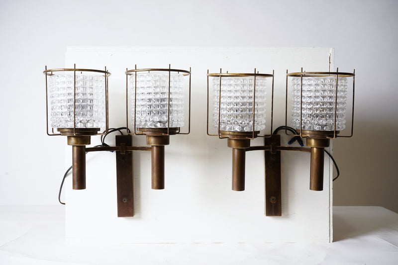 A Pair of Solid Brass Sconces with Cast Glass Lenses