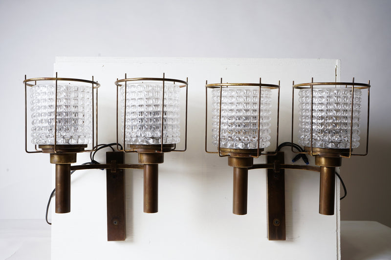 A Pair of Solid Brass Sconces with Cast Glass Lenses