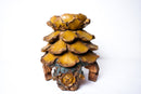A Wooden Candle Holder in the Form of an Artichoke