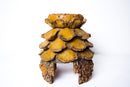 A Wooden Candle Holder in the Form of an Artichoke