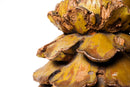 A Wooden Candle Holder in the Form of an Artichoke