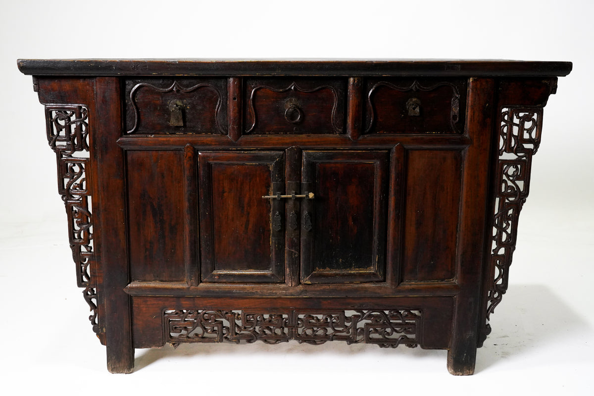 Butterfly Style Storage Cabinet With Carved Spandrels