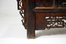 Butterfly Style Storage Cabinet With Carved Spandrels