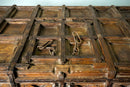 A Large Indian Storage Chest On Wheels