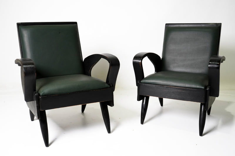A Pair of Anglo-Indian Mid-Century Arm Chairs