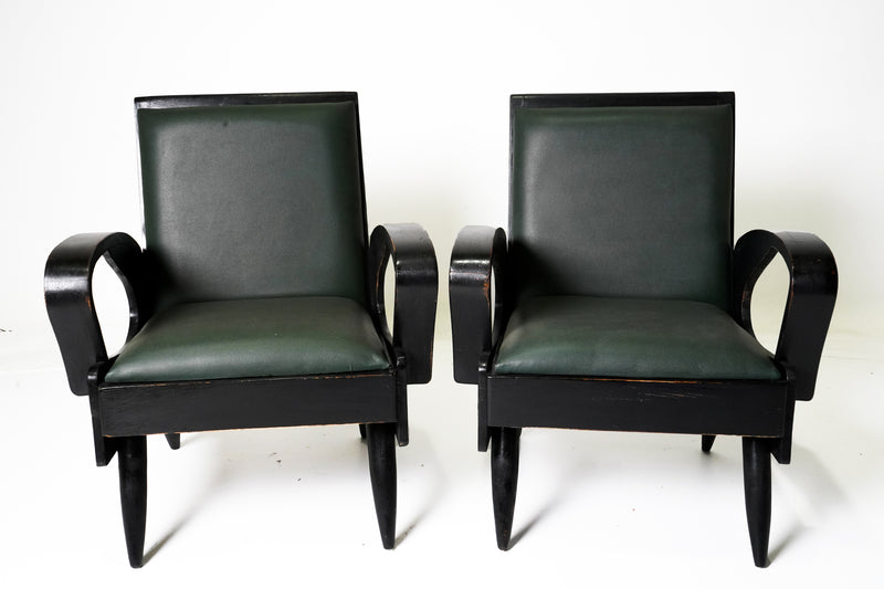 A Pair of Anglo-Indian Mid-Century Arm Chairs