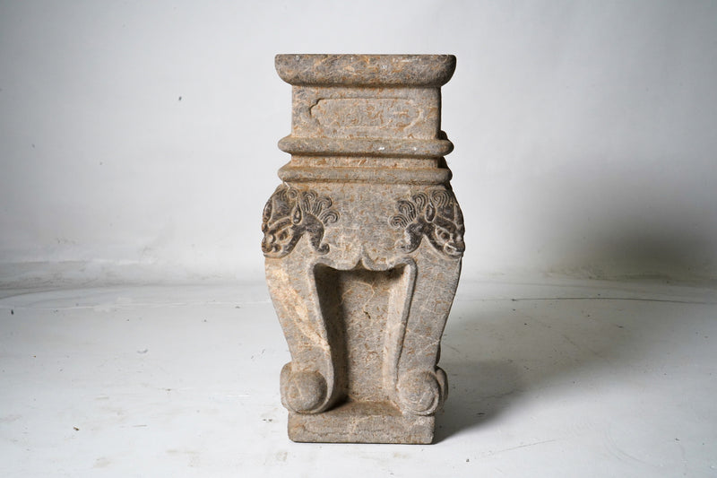 A Carved Plant Stand
