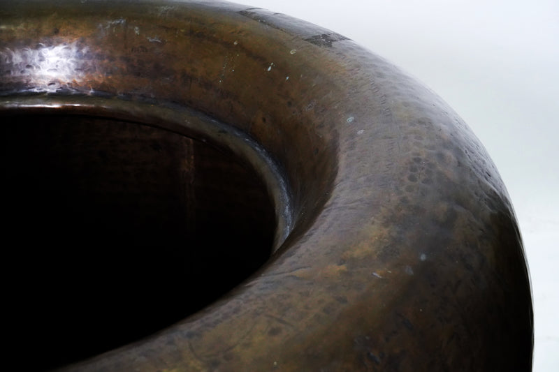 A Monumental Hammered Brass Pot