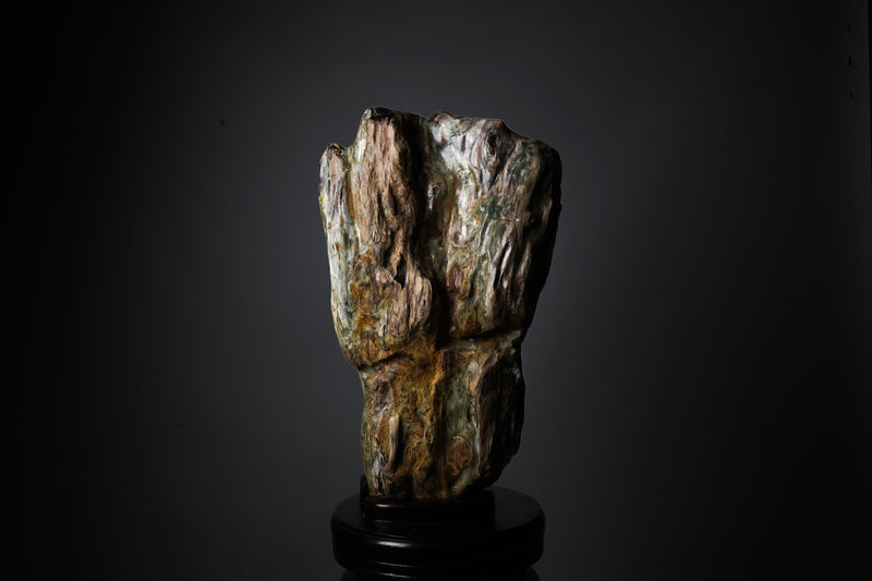 A Chinese Scholar's Stone On A Wooden Stand