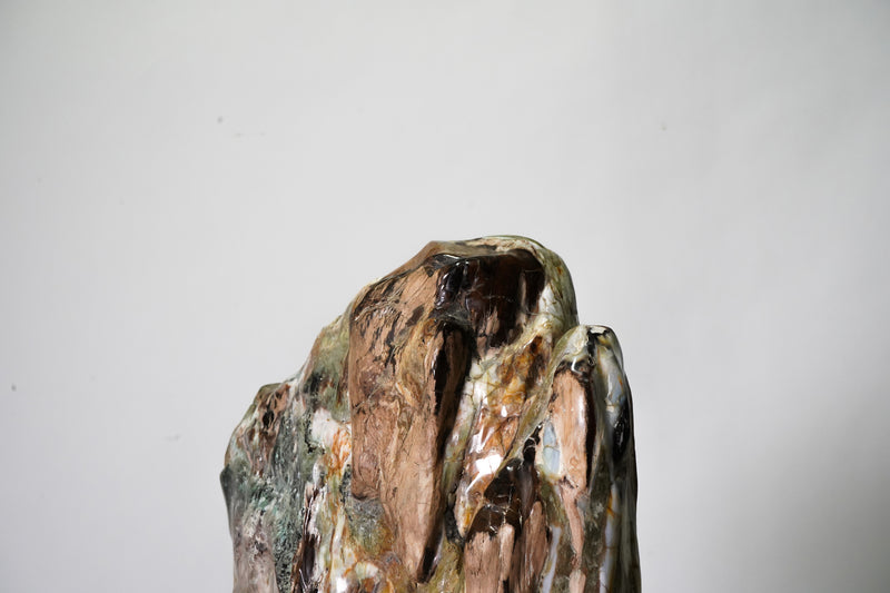A Chinese Scholar's Stone On A Wooden Stand