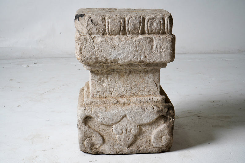 A Carved Stone Base