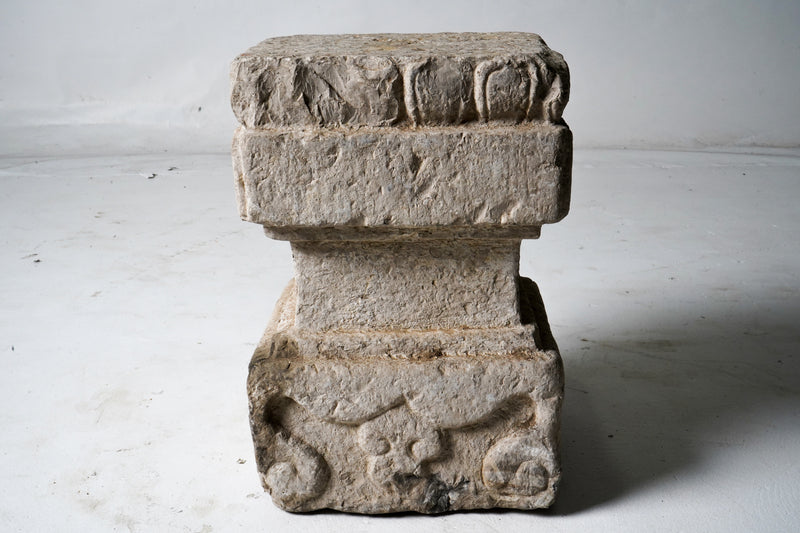 A Carved Stone Base