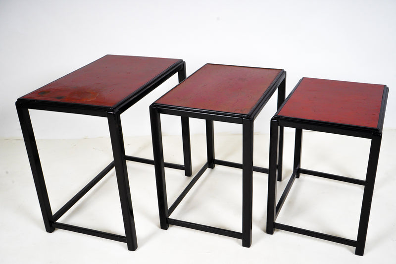 A set of 3 Nesting Side Tables with Red Lacquer Tops