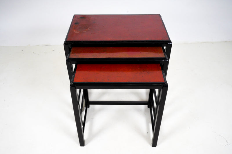 A set of 3 Nesting Side Tables with Red Lacquer Tops