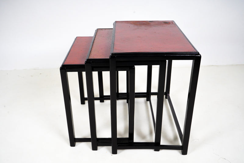 A set of 3 Nesting Side Tables with Red Lacquer Tops